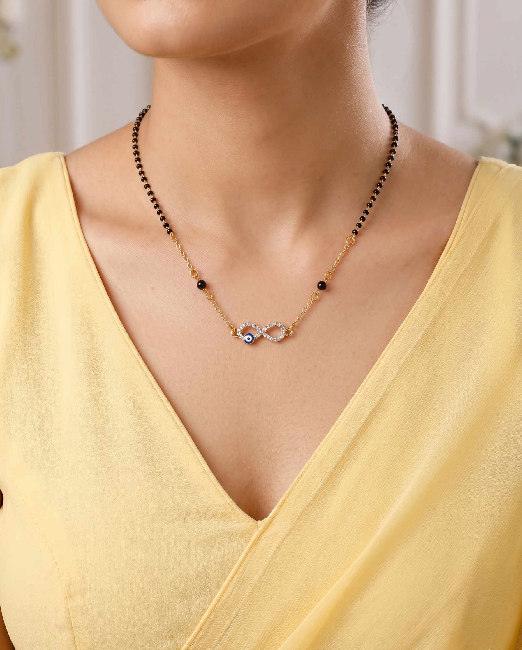 Tara N Tripti Designs - TNT AD Mangalsutra for Women, Evil Eye Infinity pendant necklace