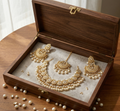 Nayantara kundan necklace set with earrings and teeka