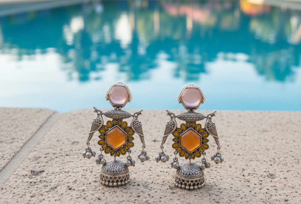 Shahaana big peacock oxidised jhumkis