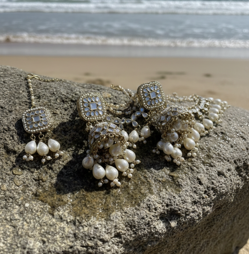 Aishwarya kundan earrings with earchains and maang teeka