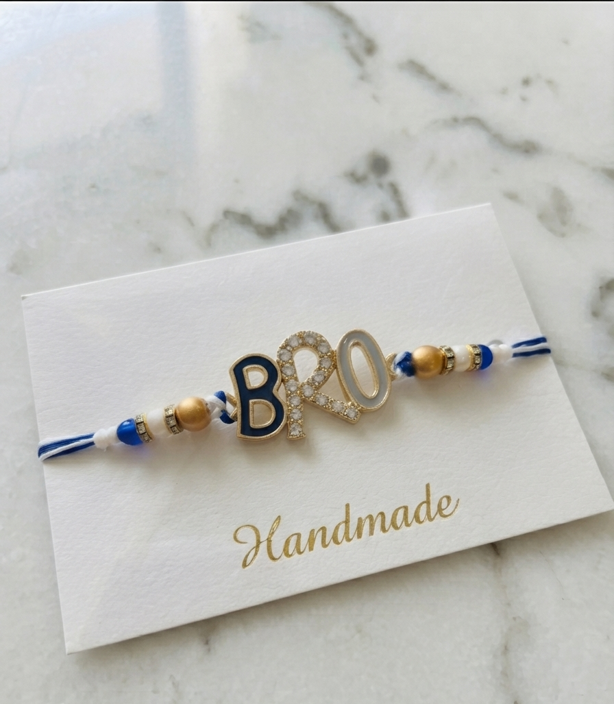 TNT Designs Stylish BRO Letter Rakhi for Brother | Navy Blue Gold Twisted Thread Rakhi with Bead Accents | BRO Design for Brother with Diamond Studded Letters