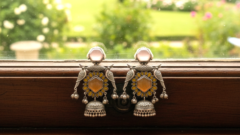 Shahaana big peacock oxidised jhumkis