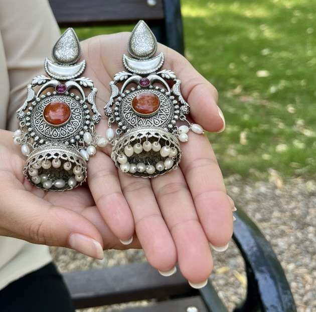 Rani silver oxidised Jhumkas