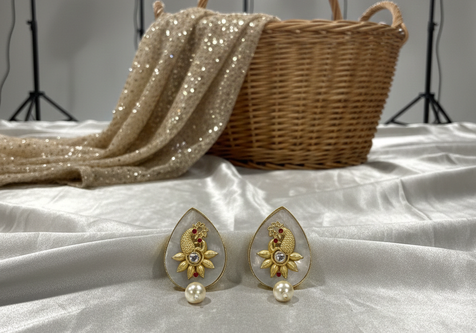 Megha peacock studs earrings with pearl drops