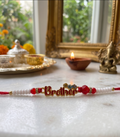 TNT -Design Handmade Red & White Beaded "Brother" Rakhi
