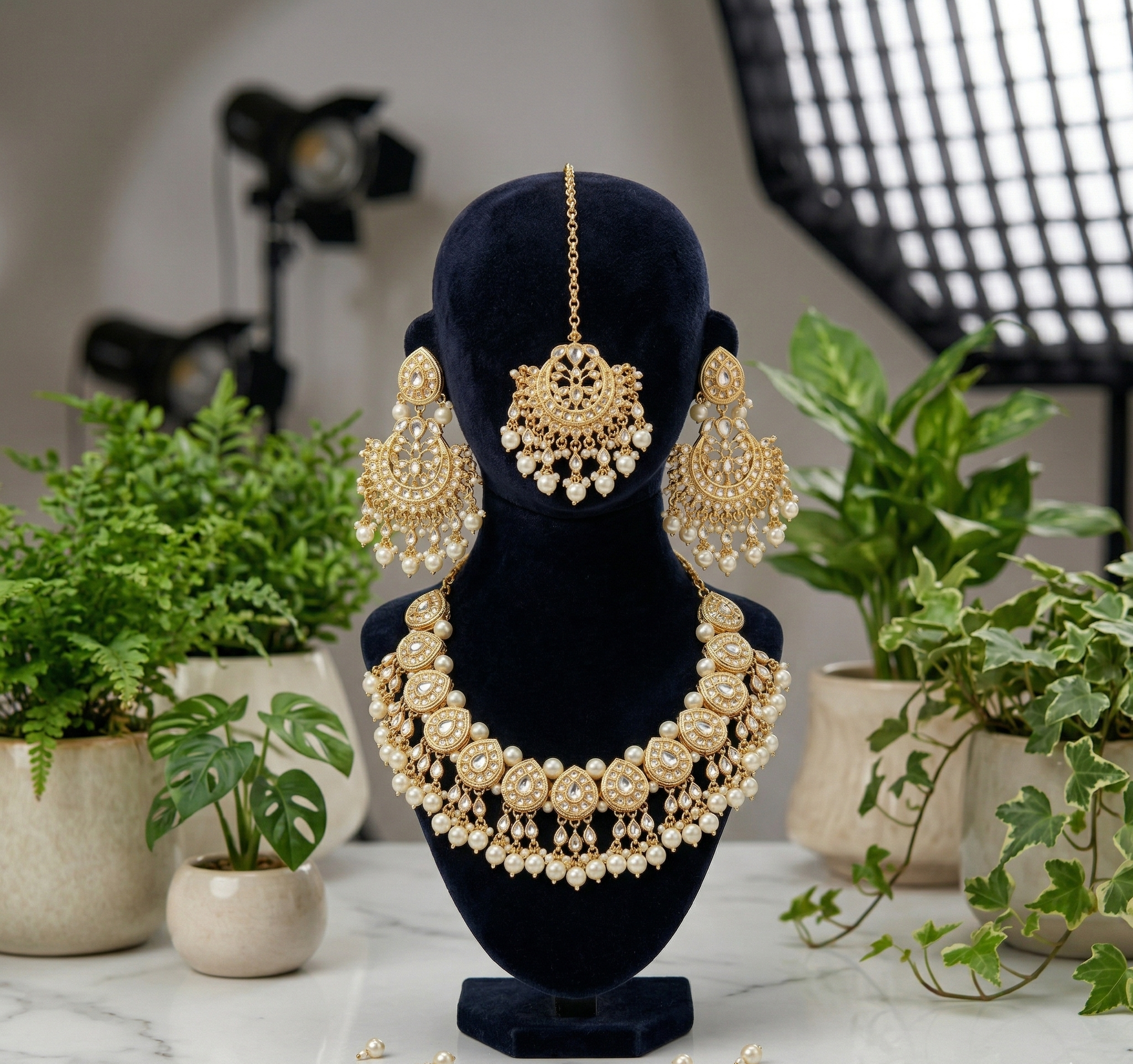 Nayantara kundan necklace set with earrings and teeka