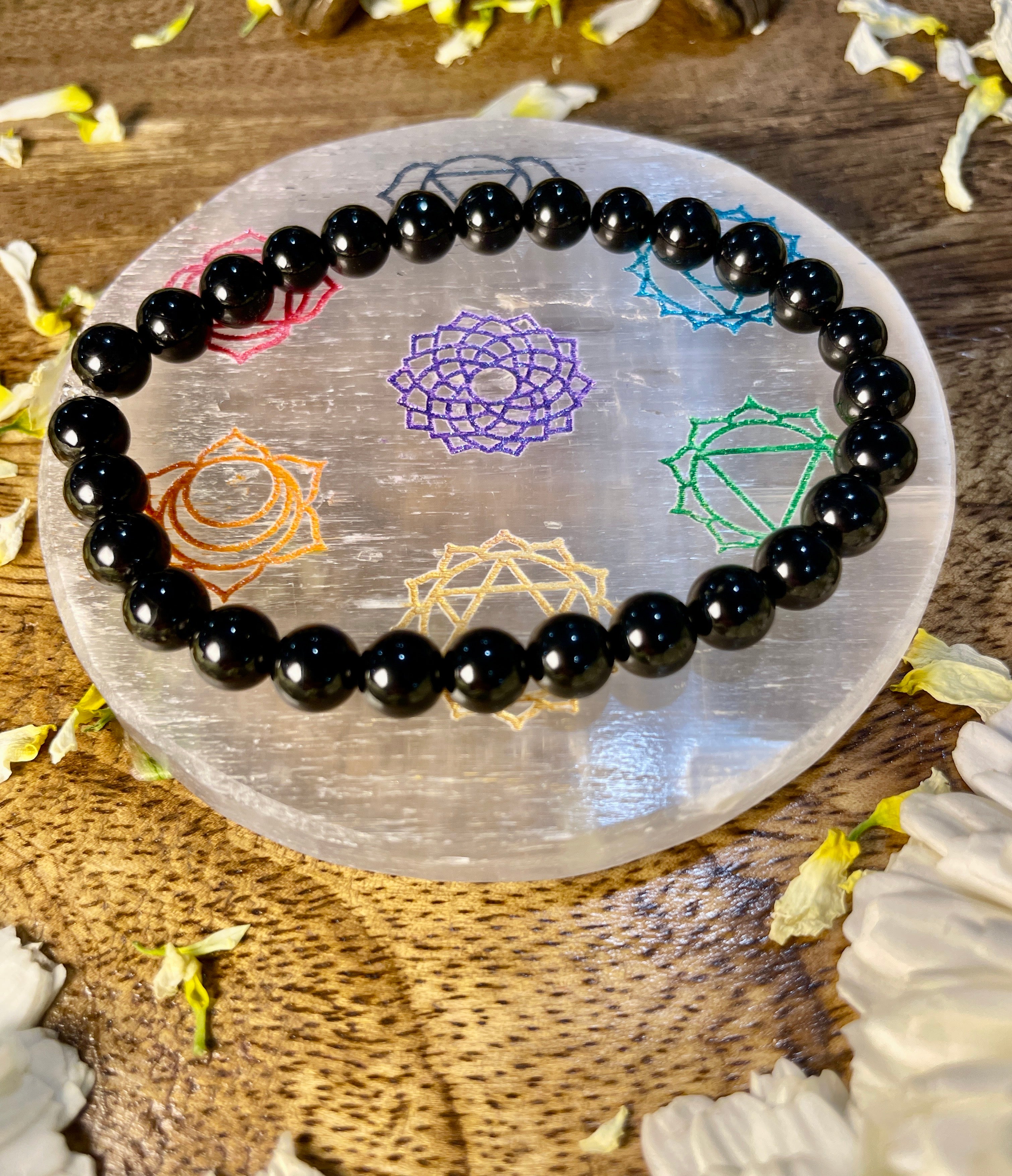 The seven chakra Selenite plate for crystal charging