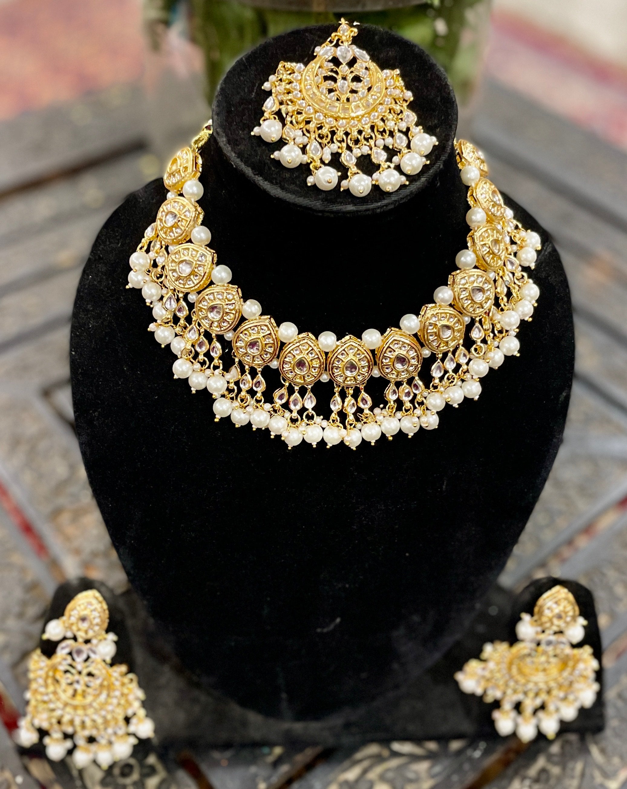 Nayantara kundan necklace set with earrings and teeka