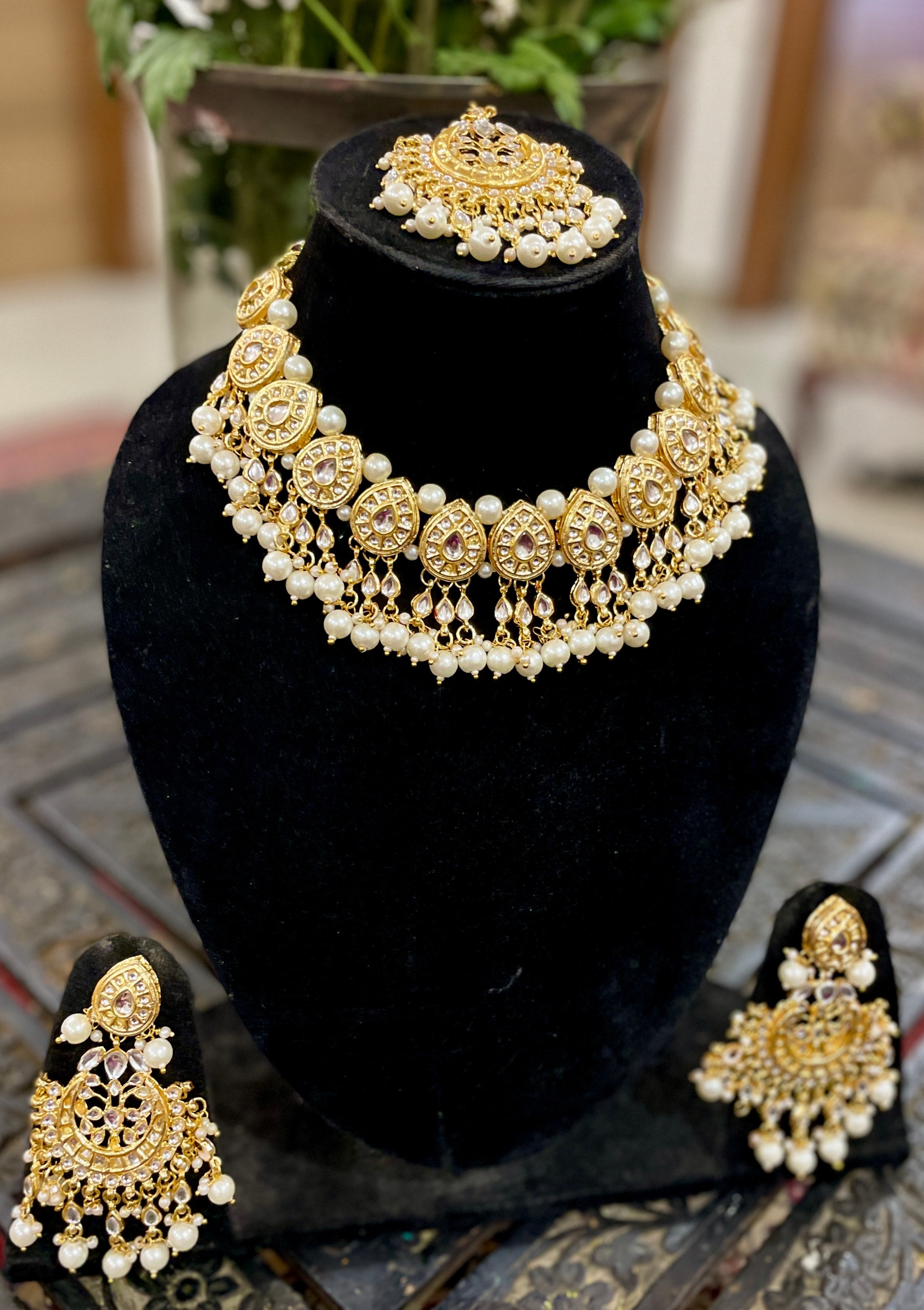 Nayantara kundan necklace set with earrings and teeka