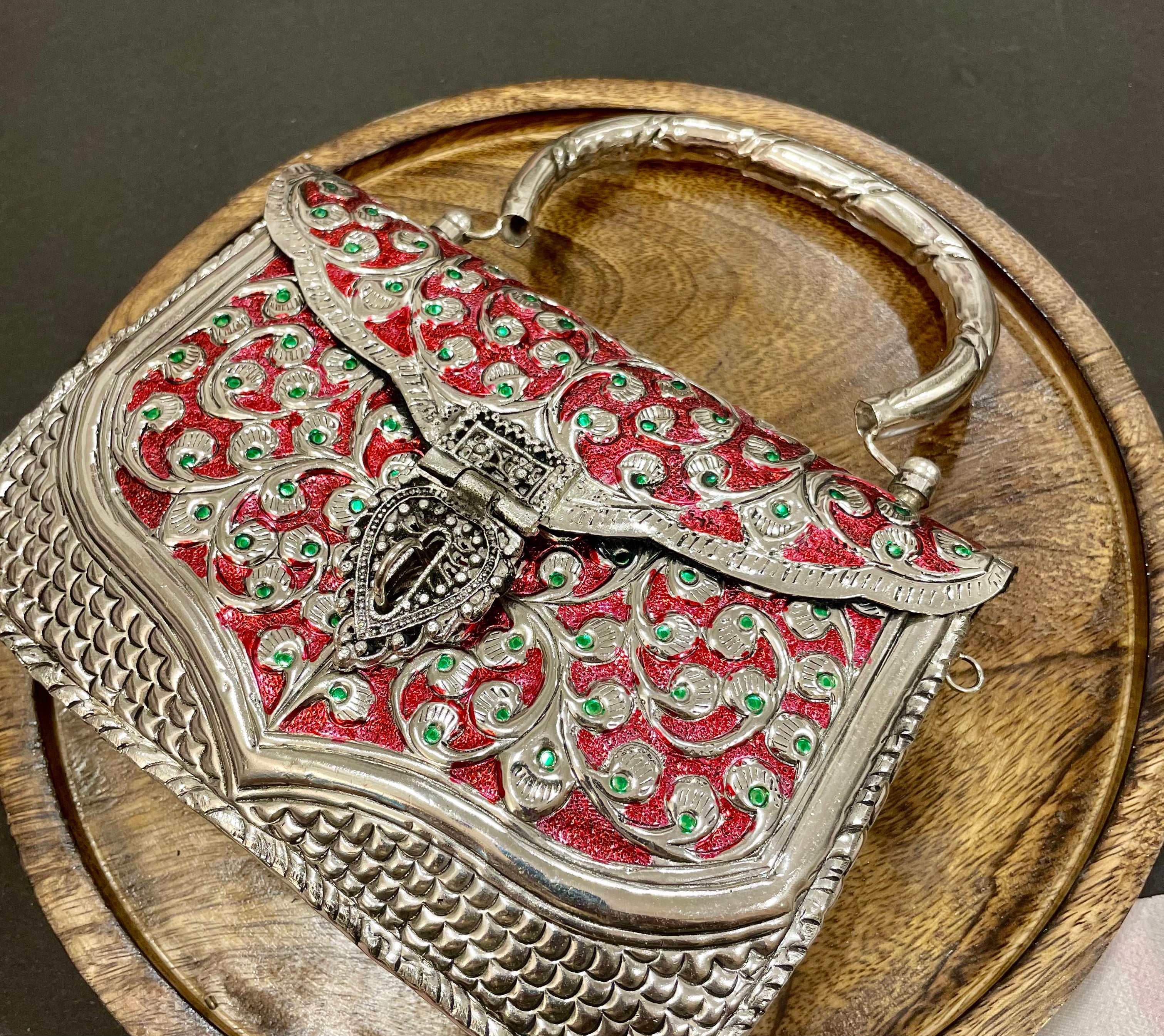 Red and silver metal bag for women
