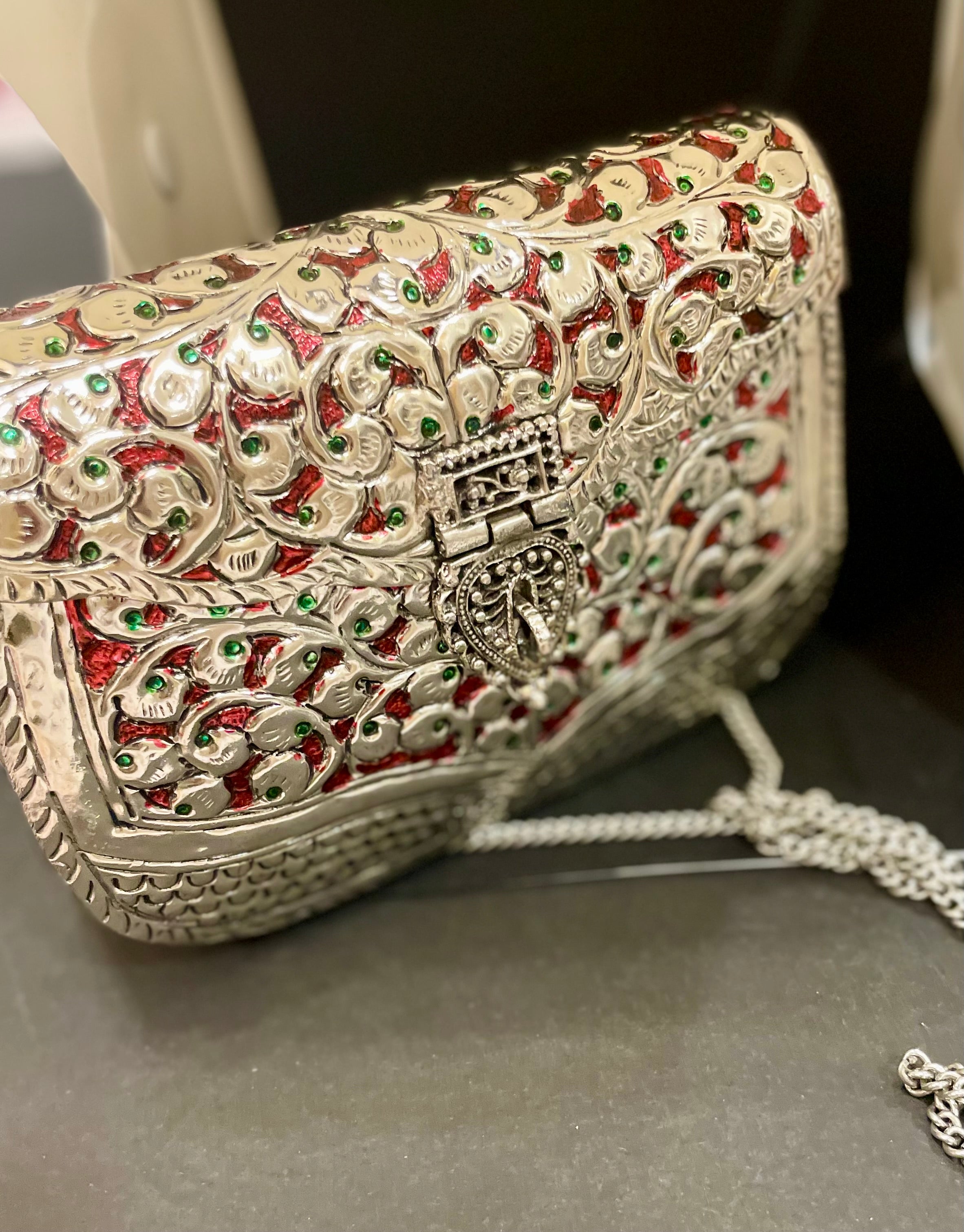 Maroon metal sling bag