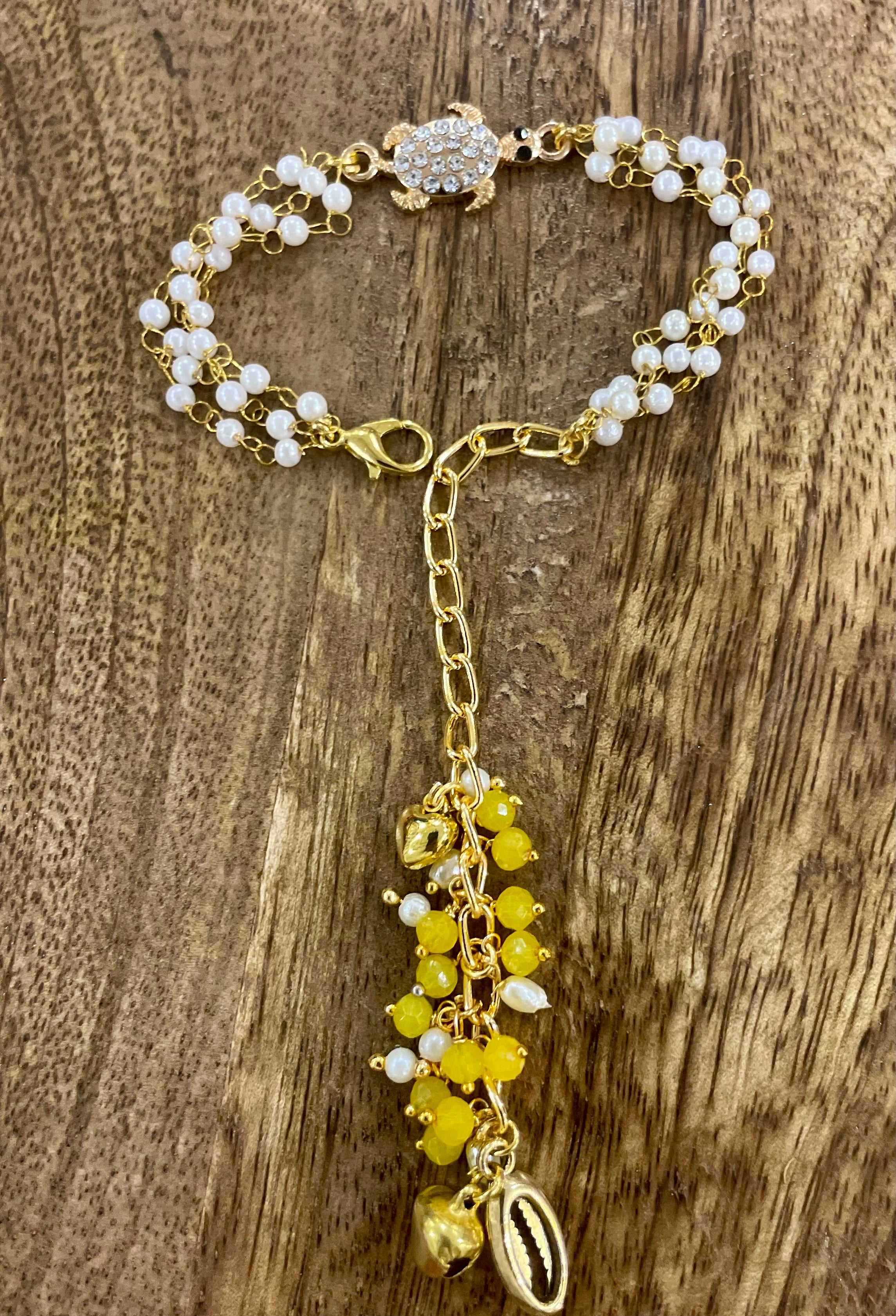 Lumba rakhi bracelet for bhabhi- shell (kauri) bracelet
