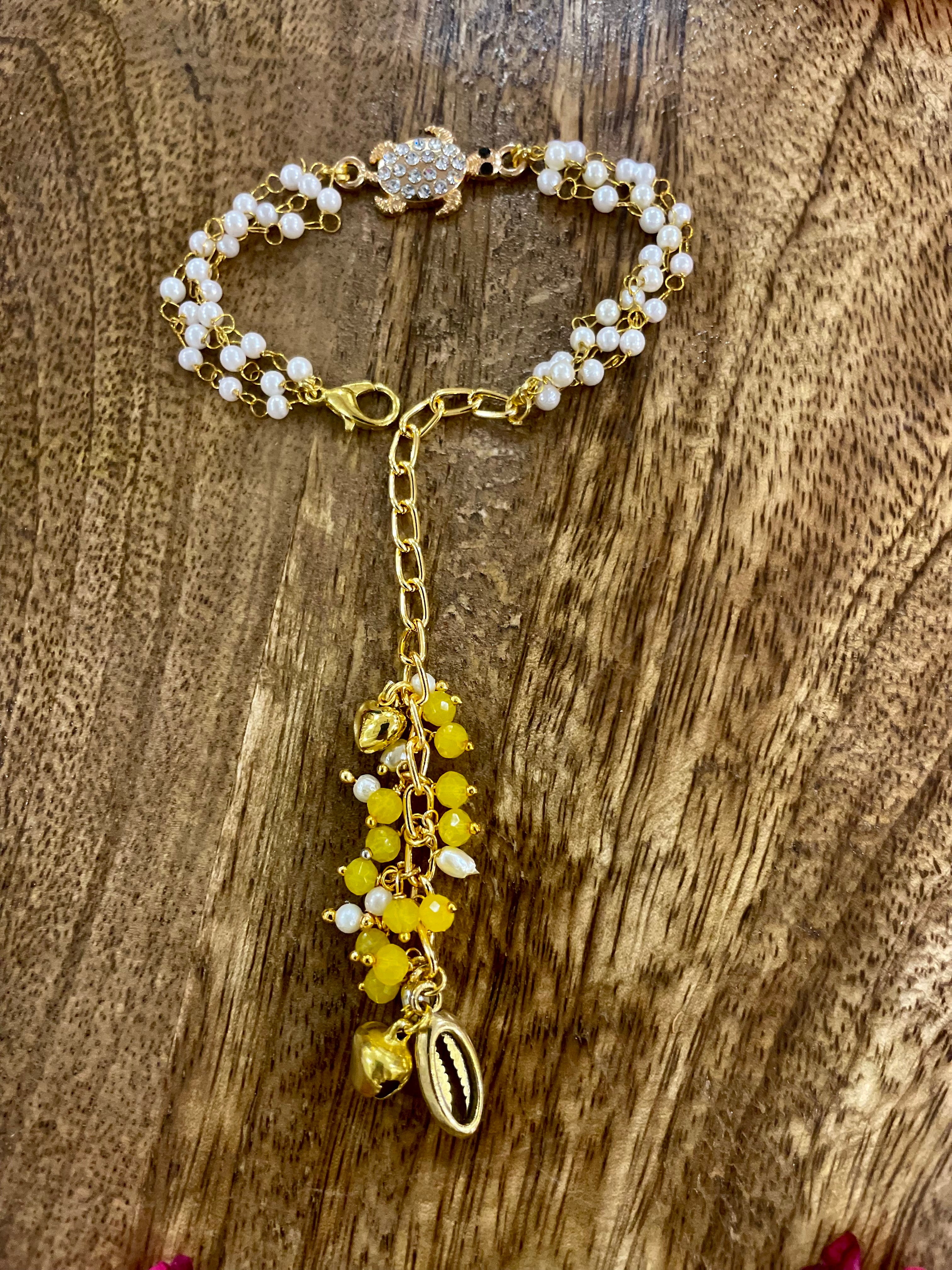 Lumba rakhi bracelet for bhabhi- shell (kauri) bracelet