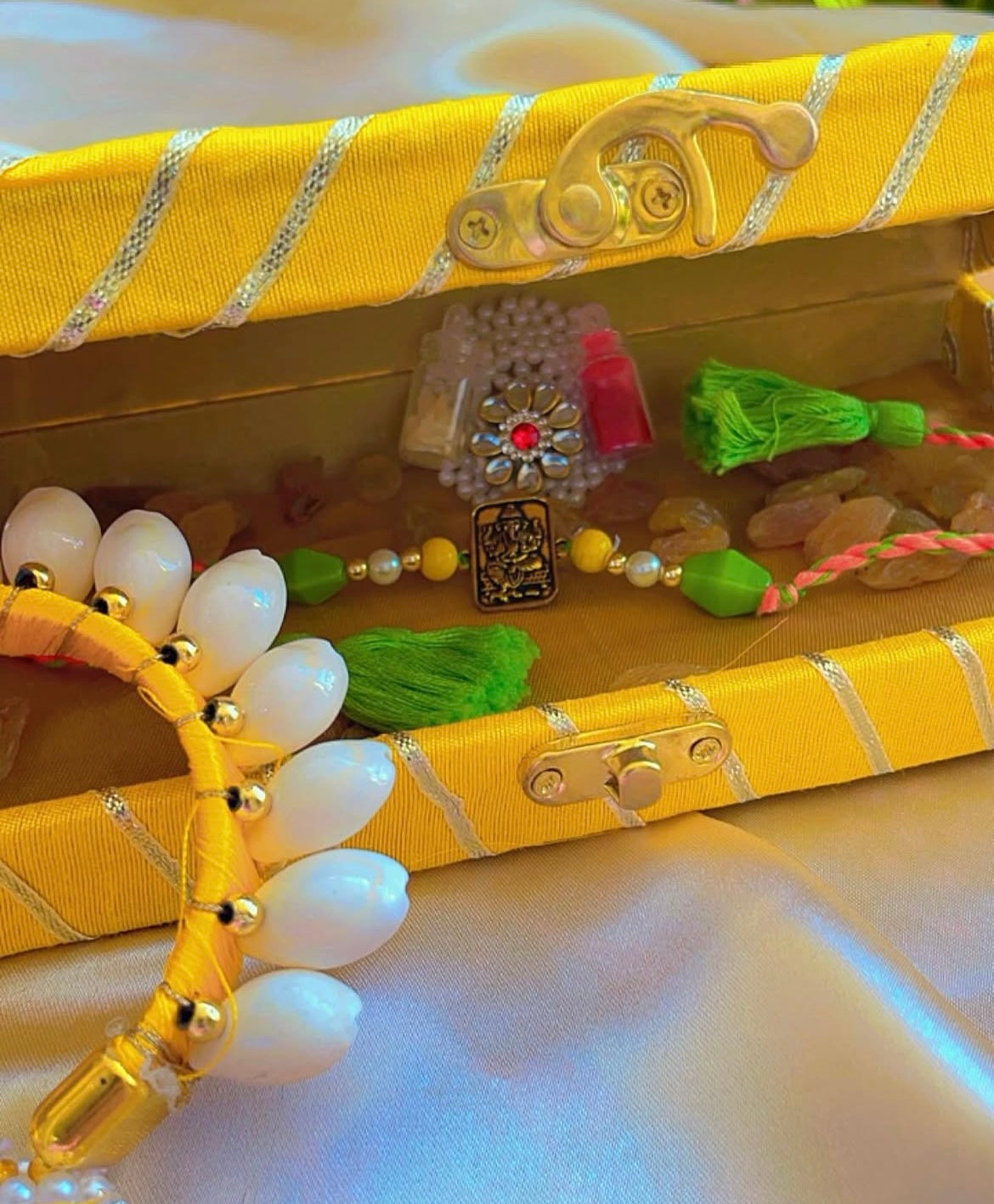 Ganesha rakhi combo with yellow green beads- Rakhi for bhai bhabhi