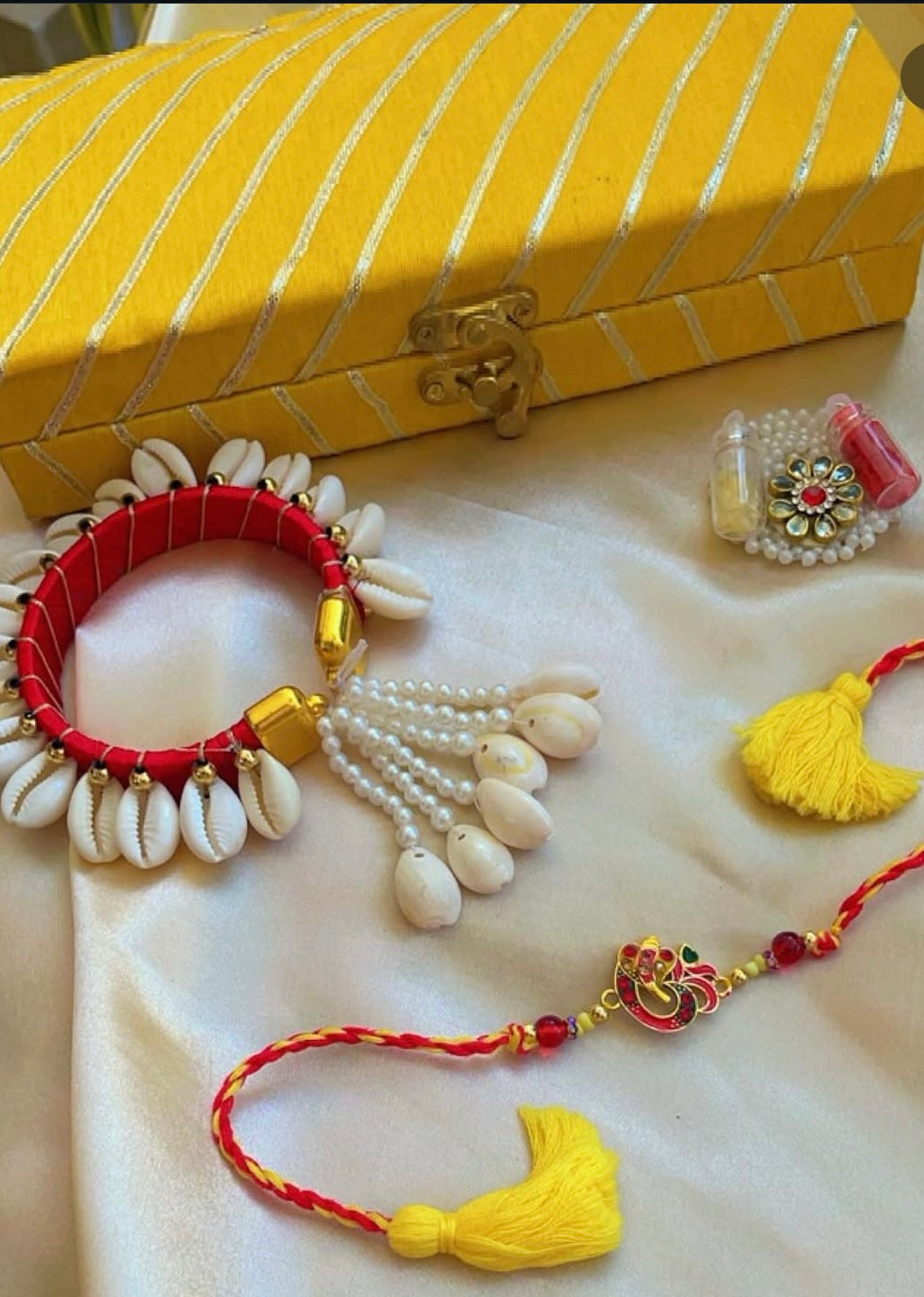 Red Ganesha rakhi combo - Rakhi for bhai and bhabhi
