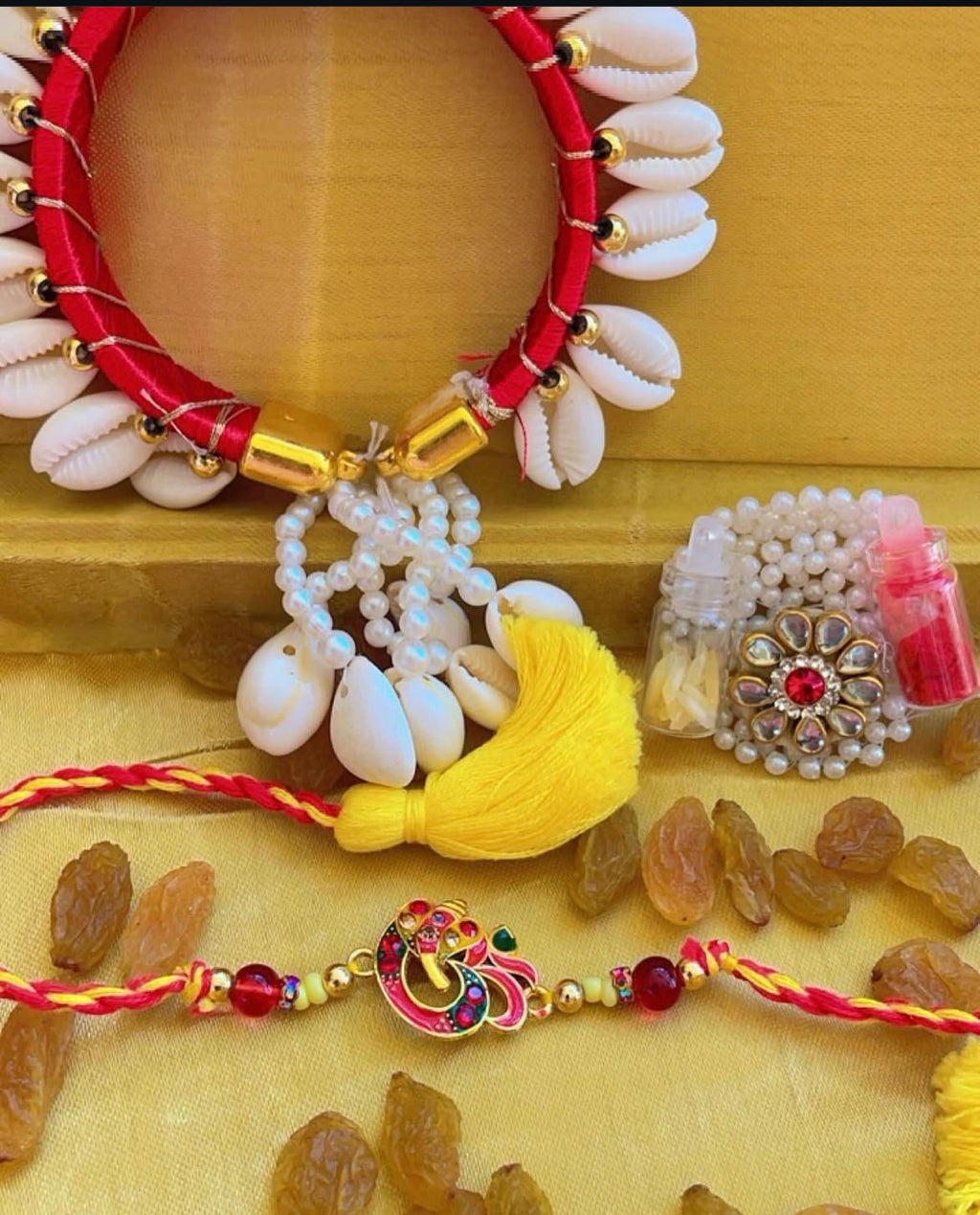 Red Ganesha rakhi combo - Rakhi for bhai and bhabhi