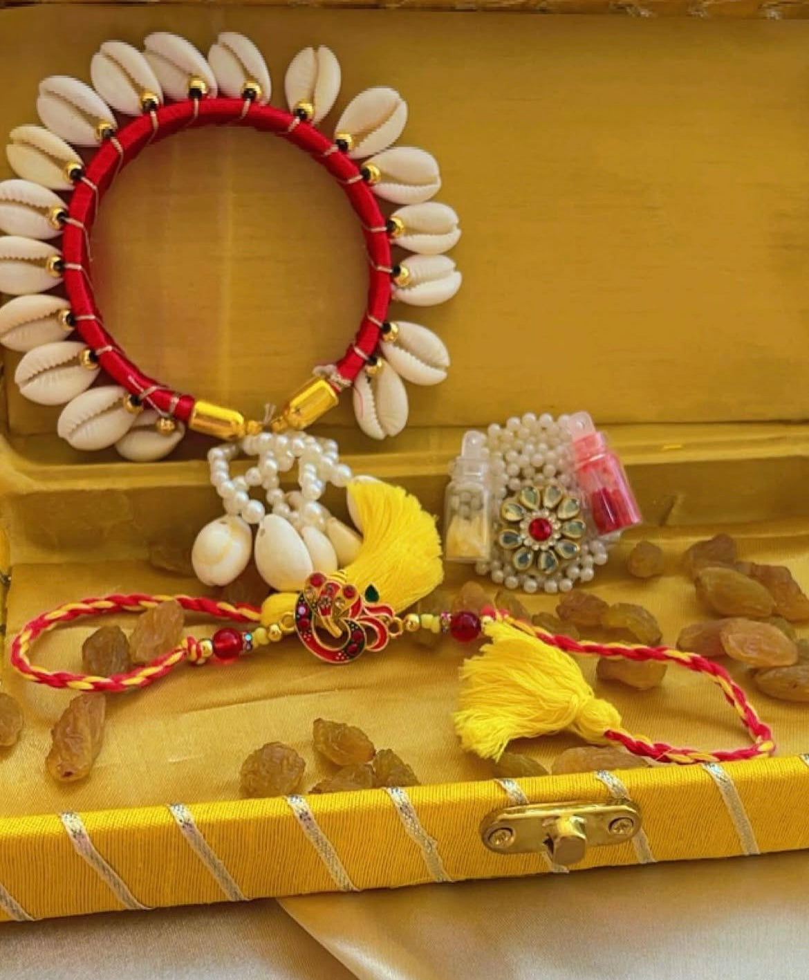 Red Ganesha rakhi combo - Rakhi for bhai and bhabhi