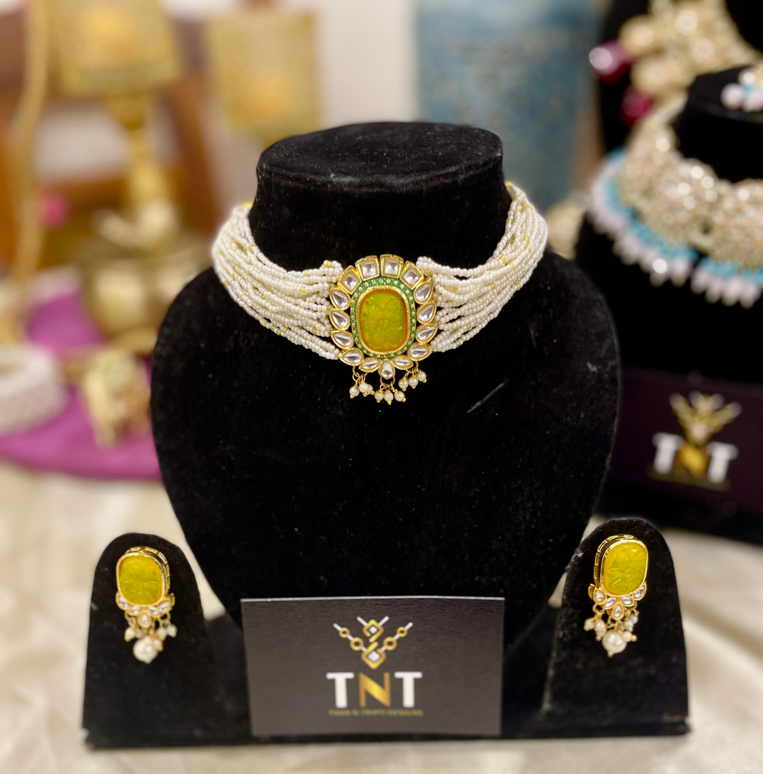 Chandni pearl choker set with yellow centre stone