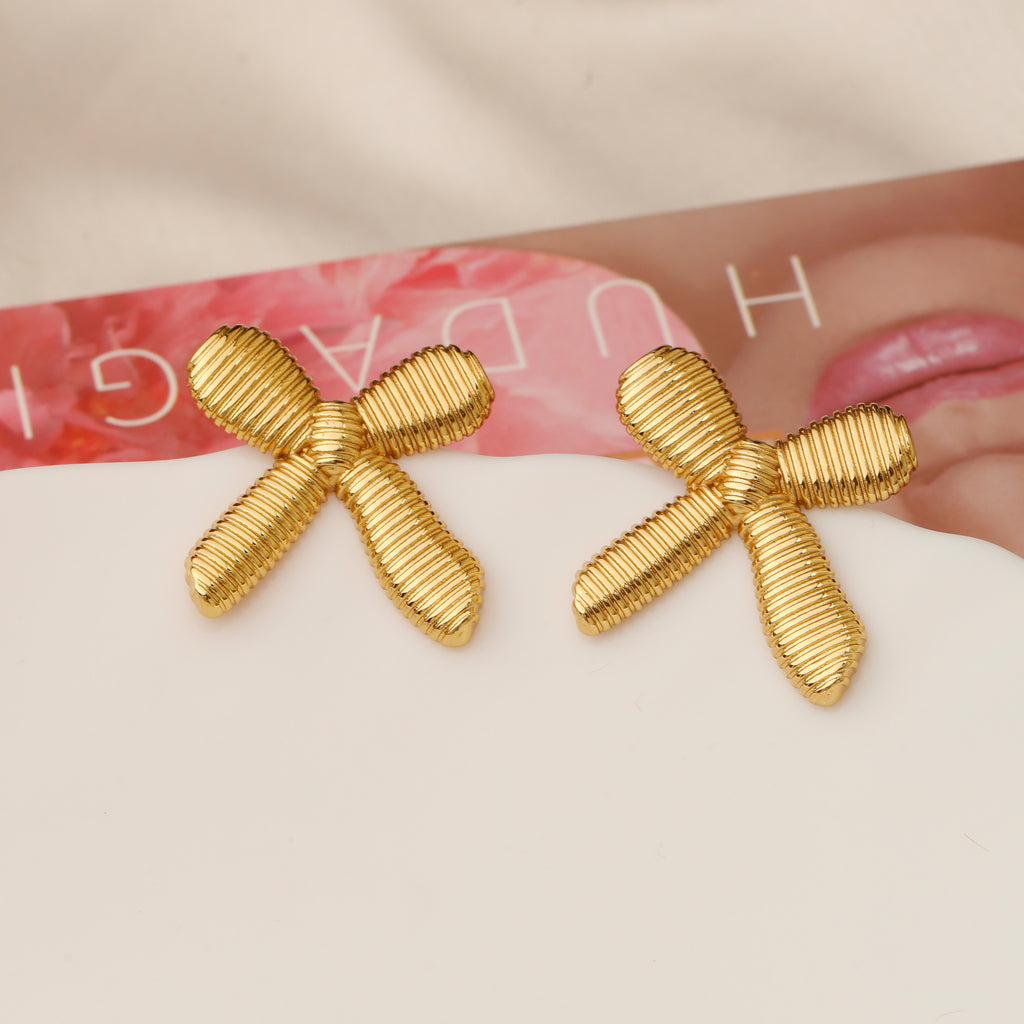 Anti tarnish bow stud earrings
